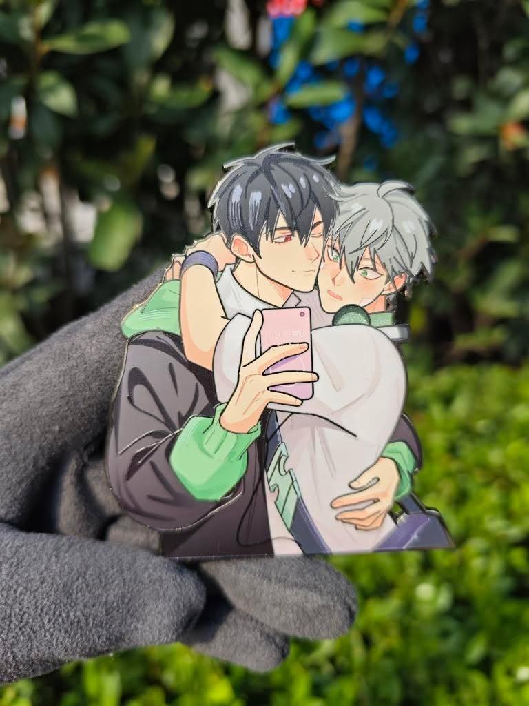 Two cuties, one phone (pin)